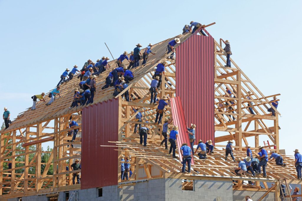 Men working on building a house